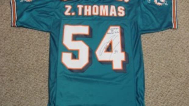  This Zach Thomas jersey, which the linebacker signed through the mail in a great signature, was found at a thrift store for $5.