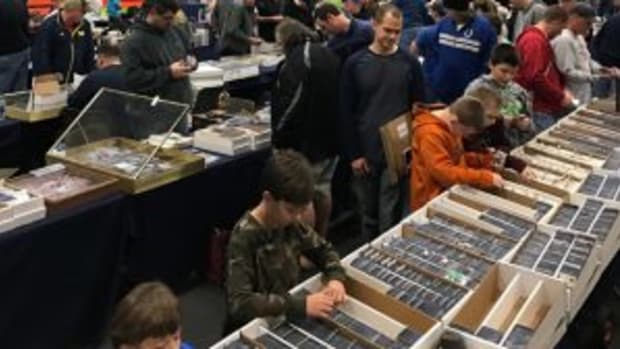 Collectors of all ages peruse the sports cards and other sports items available at the Nashville Sports Cards and Collectibles Show in late February.