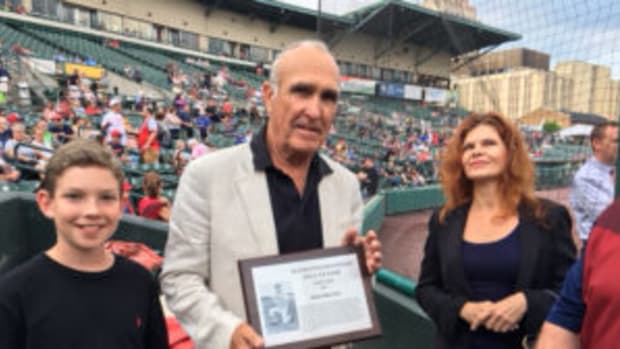  Ron Shelton holds up a plaque after being inducted in the Rochester Red Wings Hall of Fame on July 7, 2017. (Scott Pitoniak photo)
