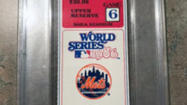  A collector from the Midwest has added QR codes to the cases of some of his graded tickets. One of the QR codes on this ticket for Game 6 of the 1986 World Series, when scanned, will lead to video of the ground ball getting by Bill Buckner, through his legs.