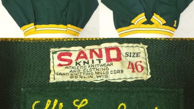 Sand Knit green, gold and white Green Bay Packers sweater previously owned and worn by the late Packers’ coaching legend Vince Lombardi ($17,250).