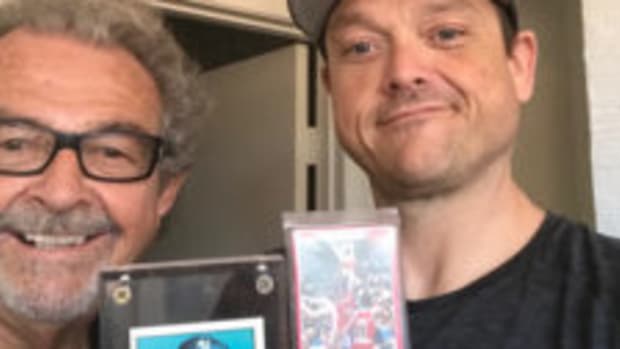  Alex Kolosow (left) and his son, Alex Kolosow II (right), proudly display high-dollar cards from their collection. (Photos courtesy Alex Kolosow)