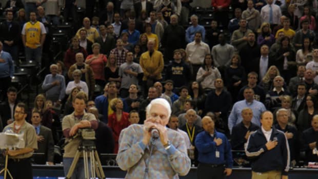 Carl Erskine performs the National Anthem on his harmonica prior to the tip-off between the Brooklyn Nets and Indiana Pacers at Bankers Life Fieldhouse on Feb. 11, 2013. 