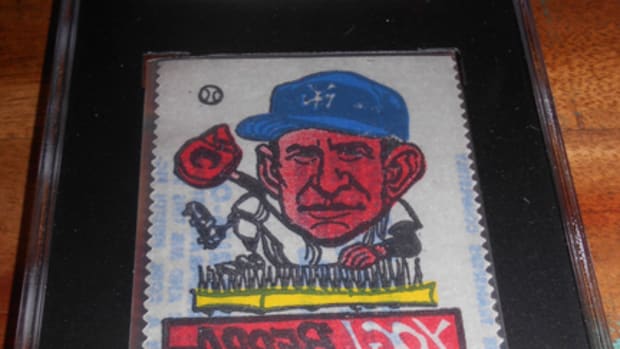 This 1961 Topps Magic Rub-Offs Yogi Berra – which grades higher than any PSA example – sold in early August 2014 for $36.88. Though the rub-offs were Topps’ premier baseball insert offering (in Series 1 packs), they can be had cheaply because the set features only two Hall of Famers in Berra and Ernie Banks.