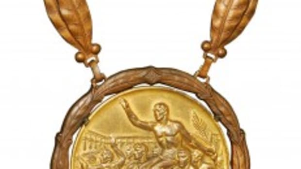 1960 Jerry Lucas USA Basketball Olympic Gold Medal, with Lucas and Hall of Fame LOAs, first one of its type ever offered. Grey Flannel Auctions image.