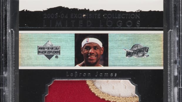 2003-04 LeBron James Exquisite Collection Limited Logos rookie auto patch card.
