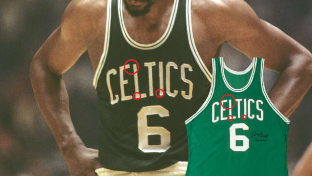 A jersey from Bill Russell's final game in 1969 sold for more than $1.1 million at Hunt Auctions.