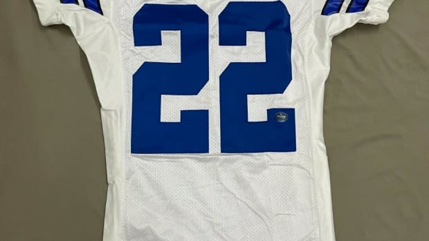 A 2002 signed, game-used Emmitt Smith jersey from Smith's personal collection.