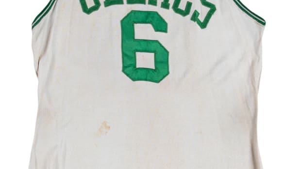 A game-used, signed Bill Russell Boston Celtics home jersey photo-matched to Game 7 of the 1966 NBA Finals Game 7.