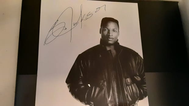 A photo of Bo Jackson that contains a facsimile autograph from Jackson.