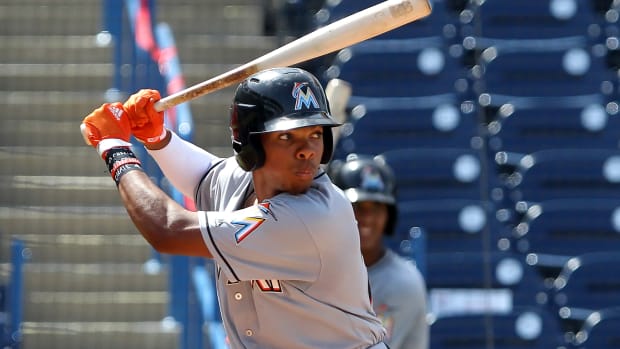 Rece Hinds, shown here in a Miami Marlins uniforms during a summer showcase, is one of the Reds' top prospects.