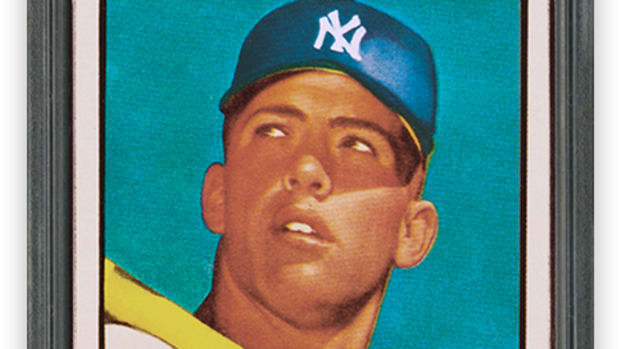 A 1952 PSA 10 Topps Mickey Mantle card on display at the Hall of Legends exhibit at the 2021 MLB All-Star Game.