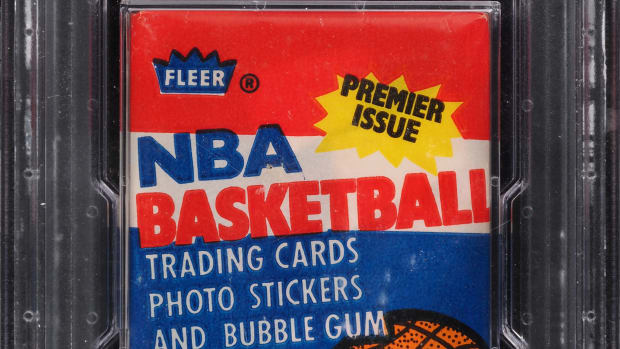 1986-87 Fleer Basketball wax pack with a Michael Jordan rookie card on top.