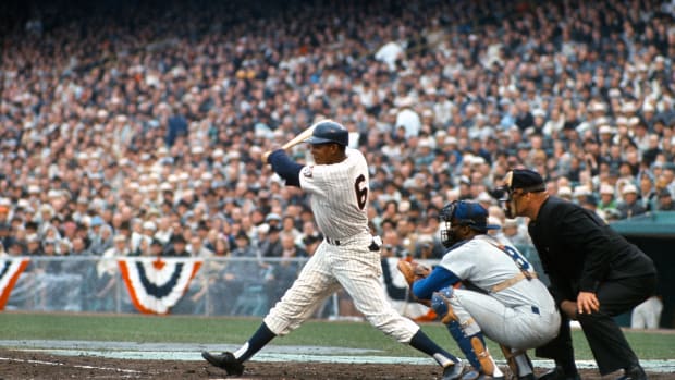Tony Oliva takes a big swing in the 1965 World Series against the Dodgers.