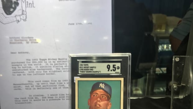 The 1952 Mickey Mantle card, graded 9.5, with the letter of provenance from Mr. Mint Al Rosen.