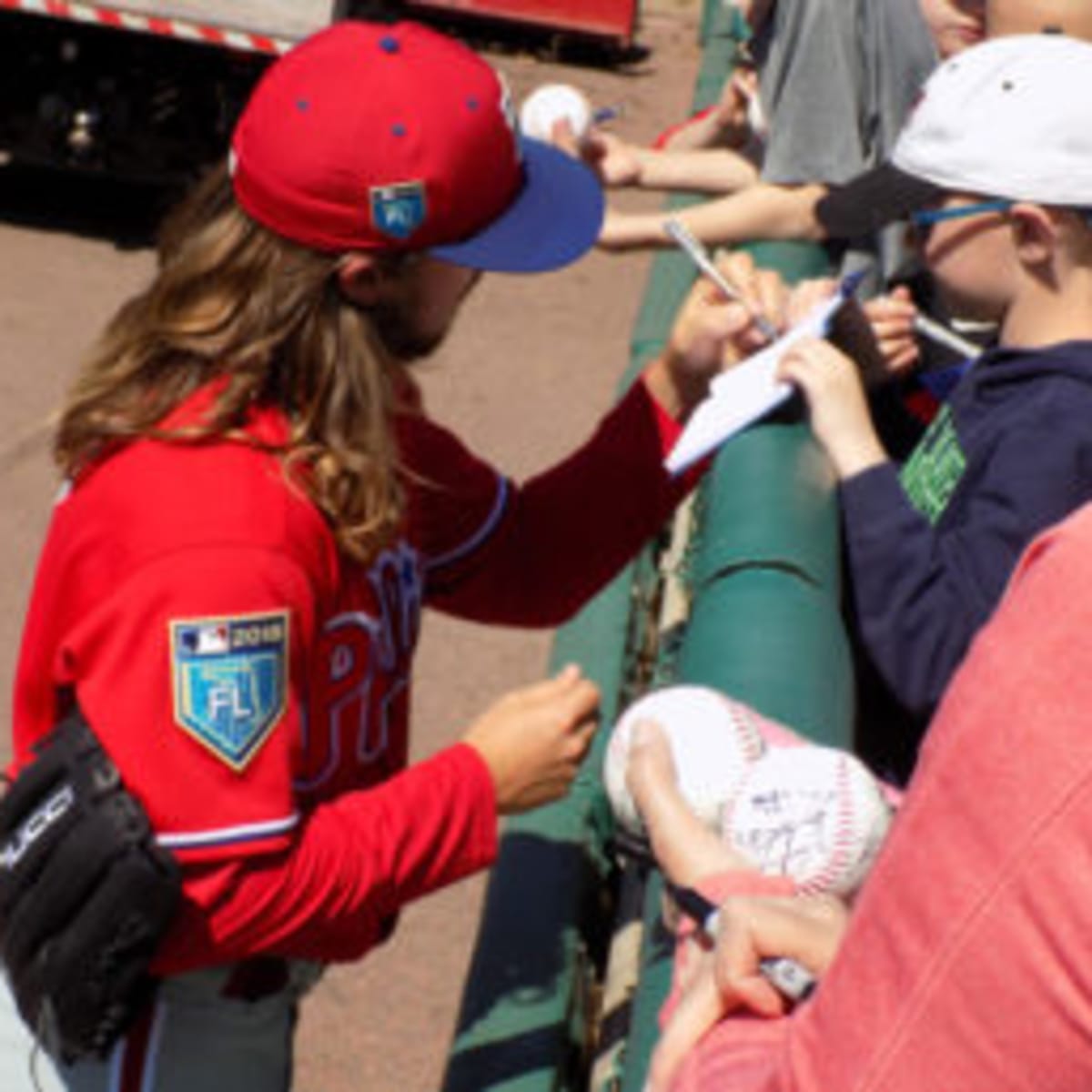 Orioles fan collects hundreds of autographs from former players