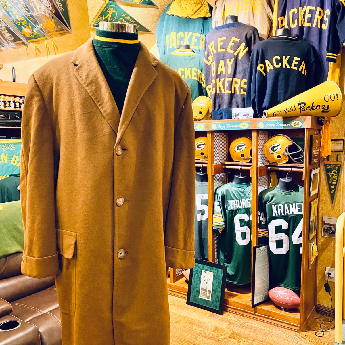 Packer fan shows off his ultimate green and gold fan cave