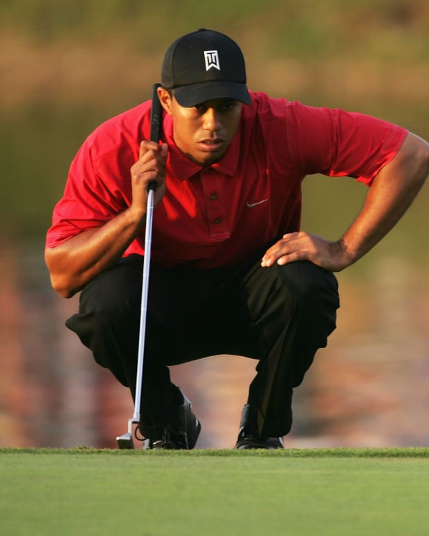 Tiger Woods lines up the winning putt at Doral in 2005. The Titleist Scotty Cameron putter Woods used to win 14 of his 15 majors is estimated to be worth as much as $30 million.