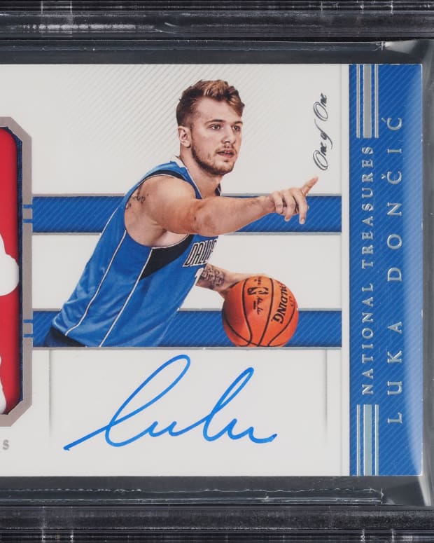 2018-19 National Treasures Logoman Luka Doncic 1/1 Rookie Patch Auto card.