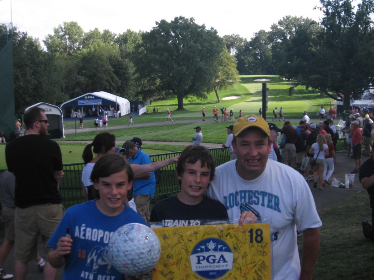 One day, three kids, one adult and more than 200 autographs. The PGA Championship practice round proved to be an autograph bonanza. Pictured are Devon, Dalton and the author. All photos courtesy of Tom Talbot. 