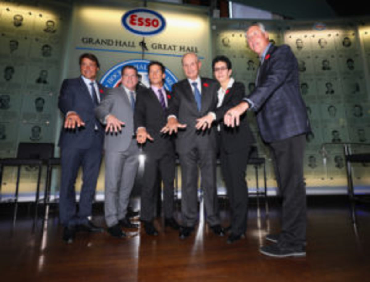  (L-R) Teemu Selanne, Mark Recchi, Paul Kariya,Jeremy Jacobs, Danielle Goyette and Dave Andreychuk take part in a media opportunity at the Hockey Hall Of Fame and Museum on November 10, in Toronto, Canada. (Photo by Bruce Bennett/Getty Images)
