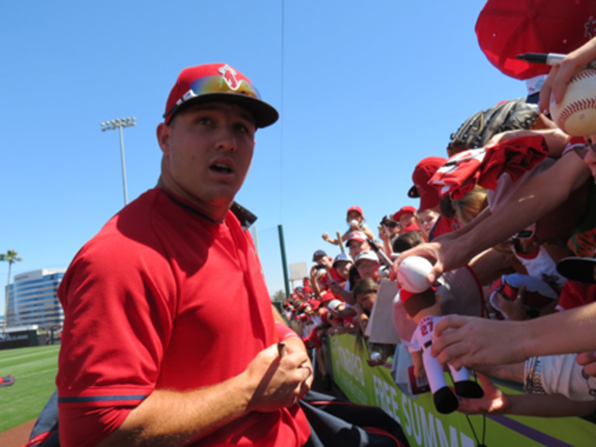 The reigning American League MVP signed in bursts of 10-20 during a reporter’s visit to Spring Training. The Major League Baseball Player’s Alumni Association was selling Trout-signed balls for $275. 