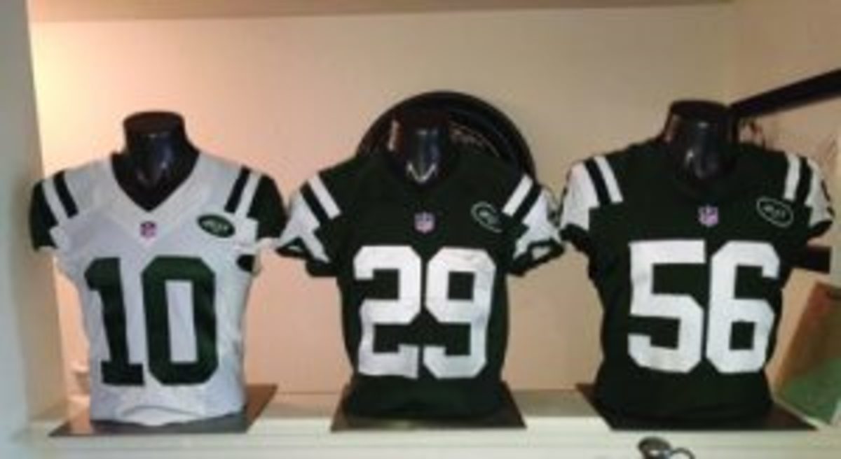 New York Jets game used jersey display in Polaniecki's living room. (Photo by Andrew Polaniecki)