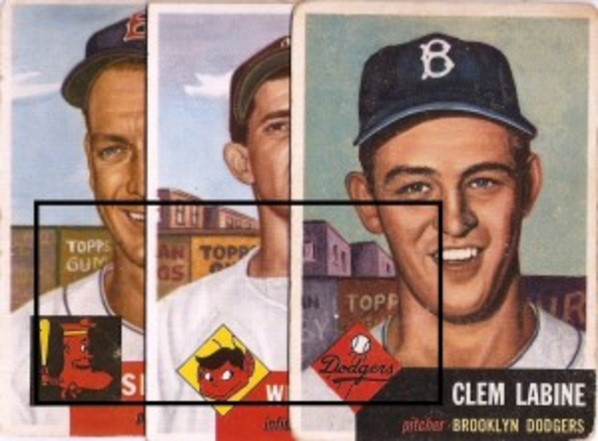 Artist Gary Dvorak told Paul Green that he put a Topps ad in the background of Labine’s card. Hudson and Miranda also had Topps ads.
