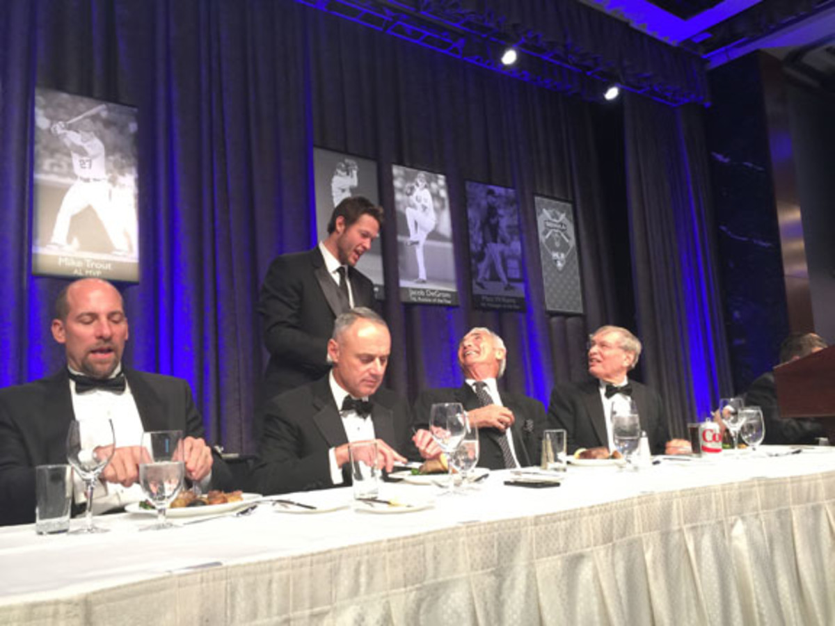 On the dais at the awards dinner of the New York chapter of the BBWAA were, from left, John Smoltz, incoming commissioner Rob Manfred, Clayton Kershaw (receiving a signed ball from Koufax), Sandy Koufax and outgoing commissioner Bud Selig. David Moriah photos. 