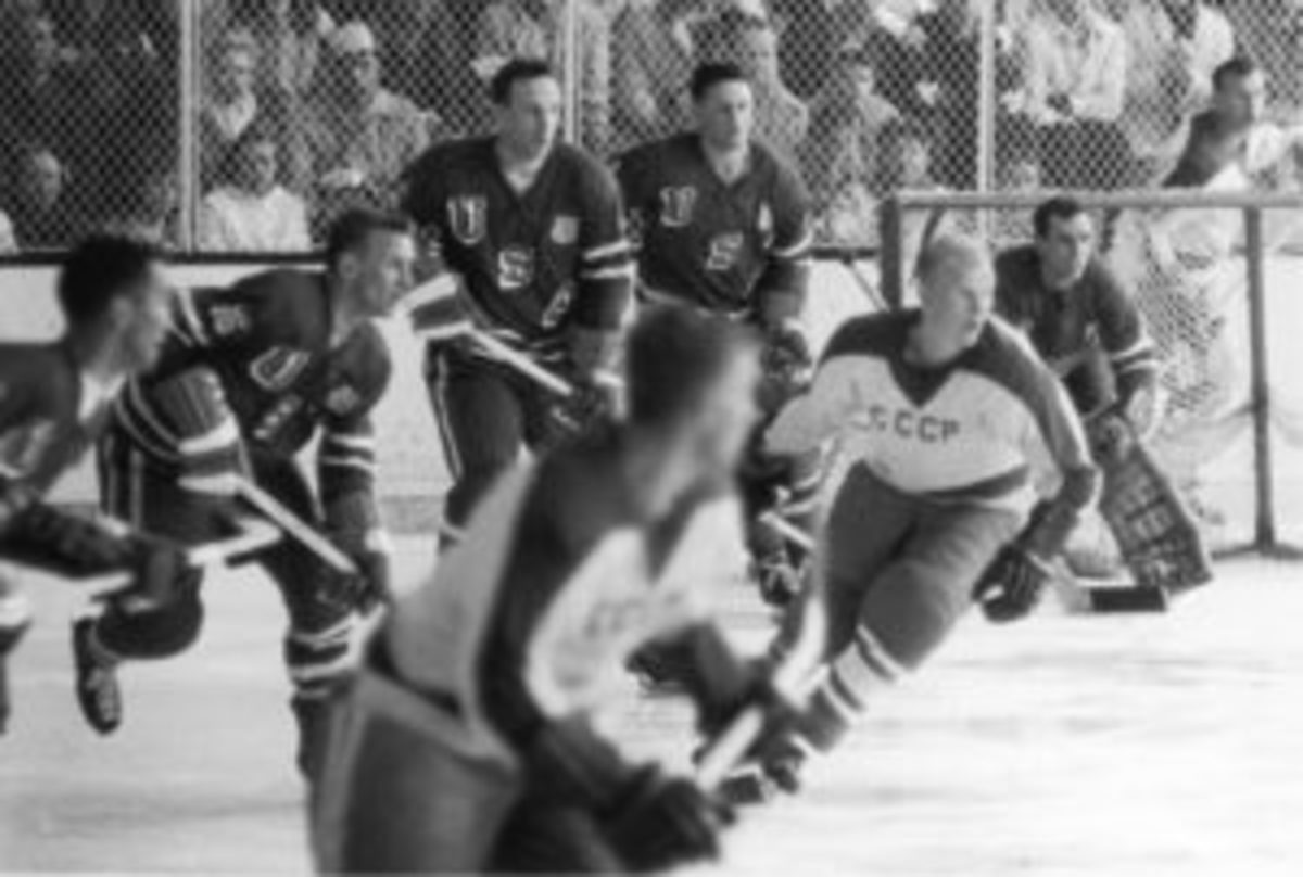  John Mayasich (third from left), defenseman for Team USA, on the ice during the final round of men’s ice hockey with the Soviet Team at the 1960 Winter Olympic Games in Blyth Arena at the Squaw Valley Ski Resort, Olympic Valley, California, Feb. 27, 1960. American Jack McCartan (right), goalie for Team USA, guards the goal. The American team scored a 3-2 victory over the Soviet Team and eventually won the gold medal. (Photo by Bruce Bennett Studios/Getty Images)