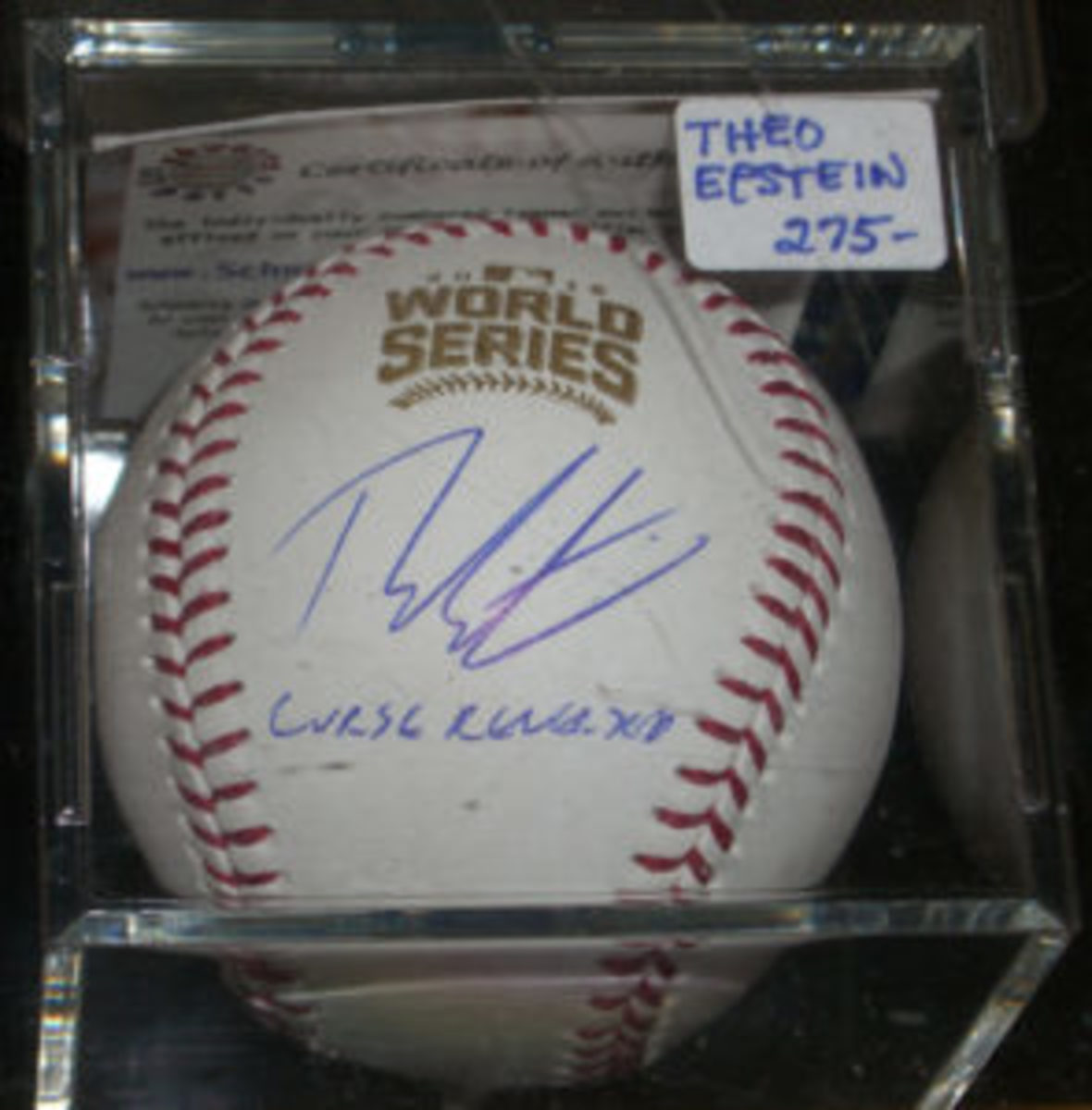  A baseball autographed by Theo Epstein had a sale price of $275. (Ross Forman photo)