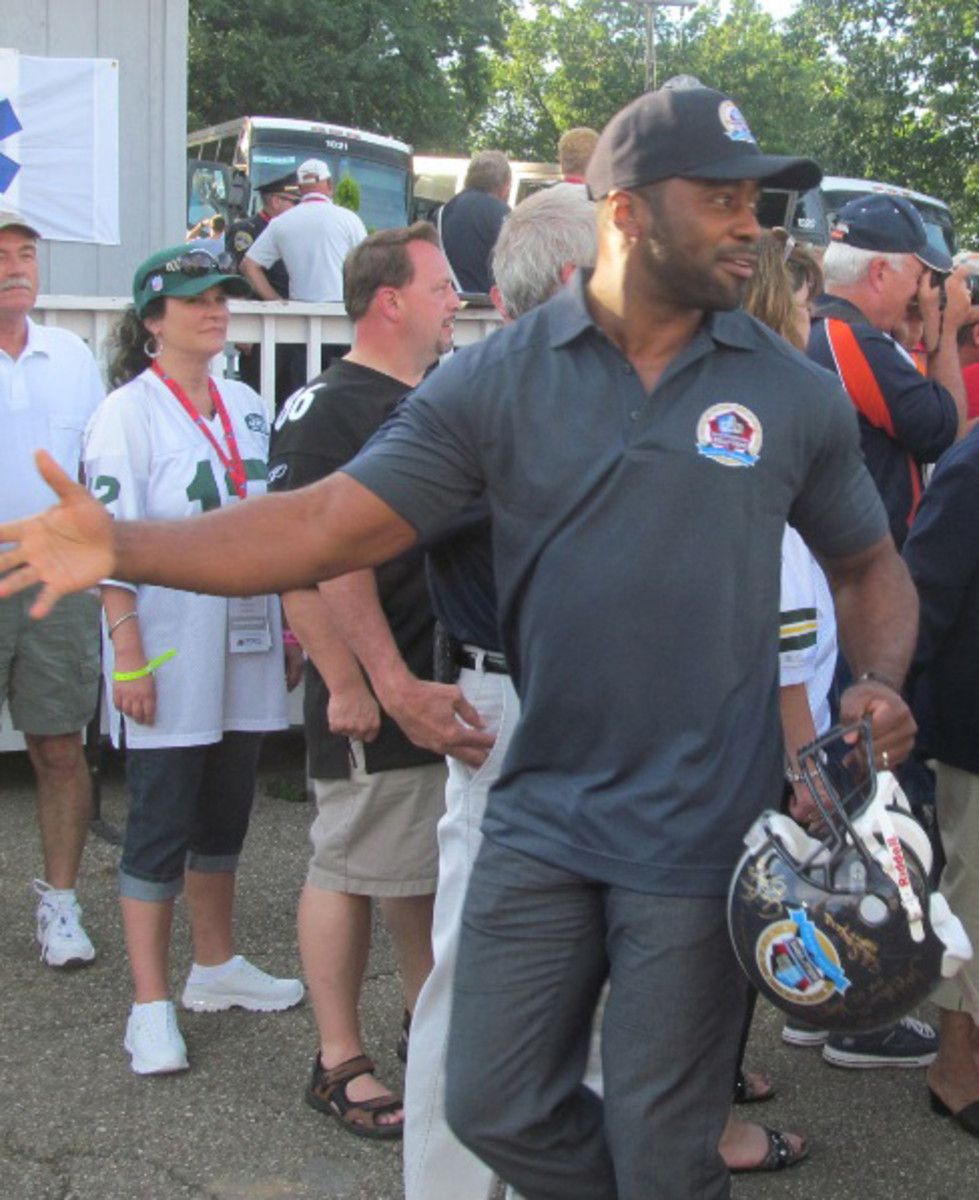 Among the current Hall of Famers who enjoyed the 50th anniversary logo helmets was Curtis Martin, who ran around getting his fellow members to sign his. 