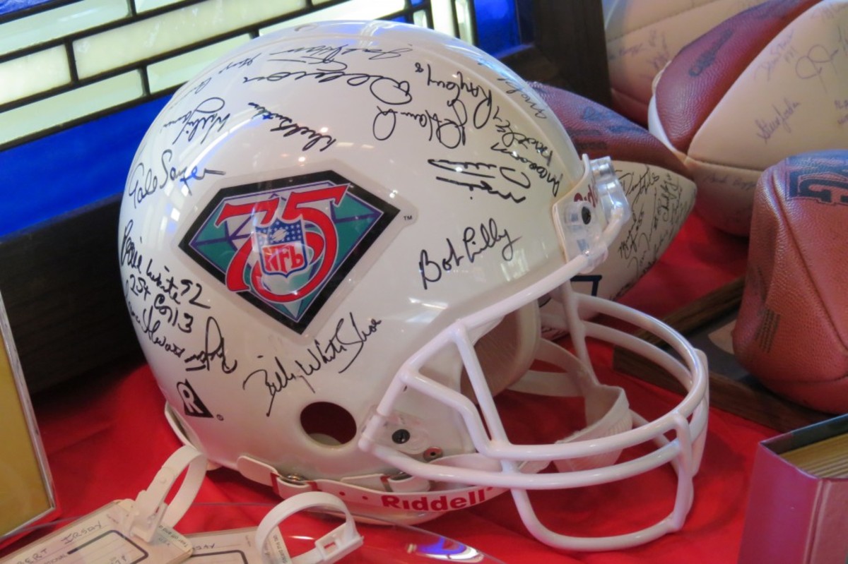 One of the lots in the Nancy Irsay Estate Auction was a helmet commemorating the 75th Anniversary of the NFL. The helmet contained autographs of several members of the 75th Anniversary Team. Photos by Joe Dynlacht.