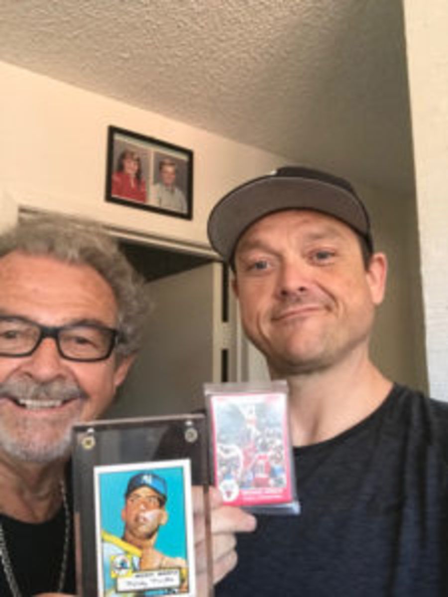  Alex Kolosow (left) and his son, Alex Kolosow II (right), proudly display high-dollar cards from their collection. (Photos courtesy Alex Kolosow)