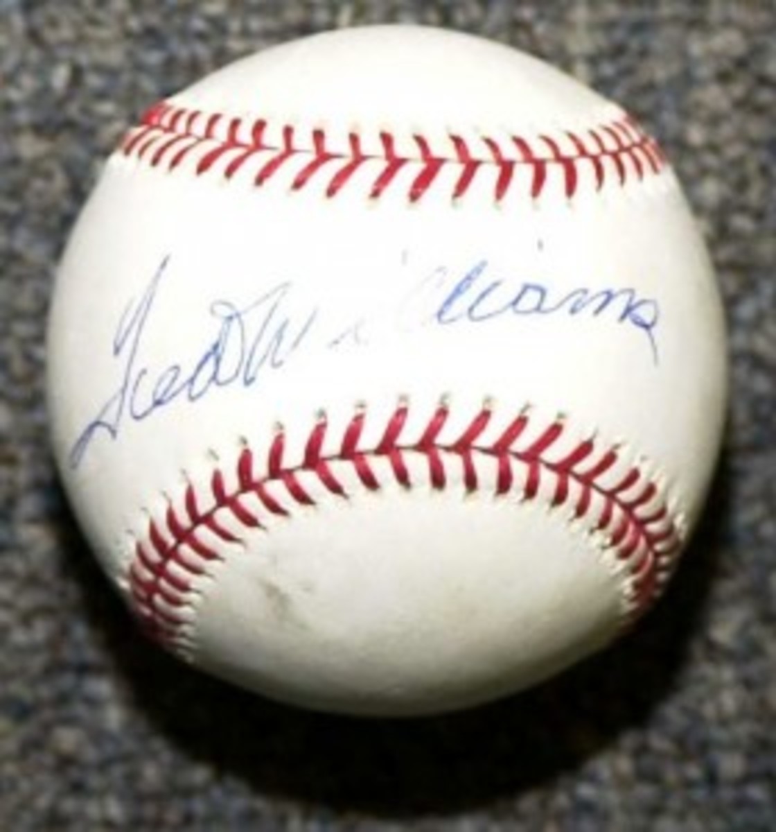 This Ted Williams ball was signed on the sweet spot – and it’s fake.