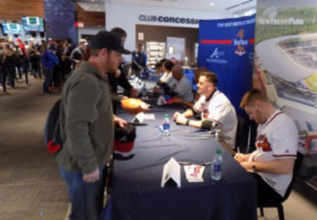  Atlanta Braves first baseman Freddie Freeman signs an autograph for a fan at Chop Fest. (Barry Blair photos)