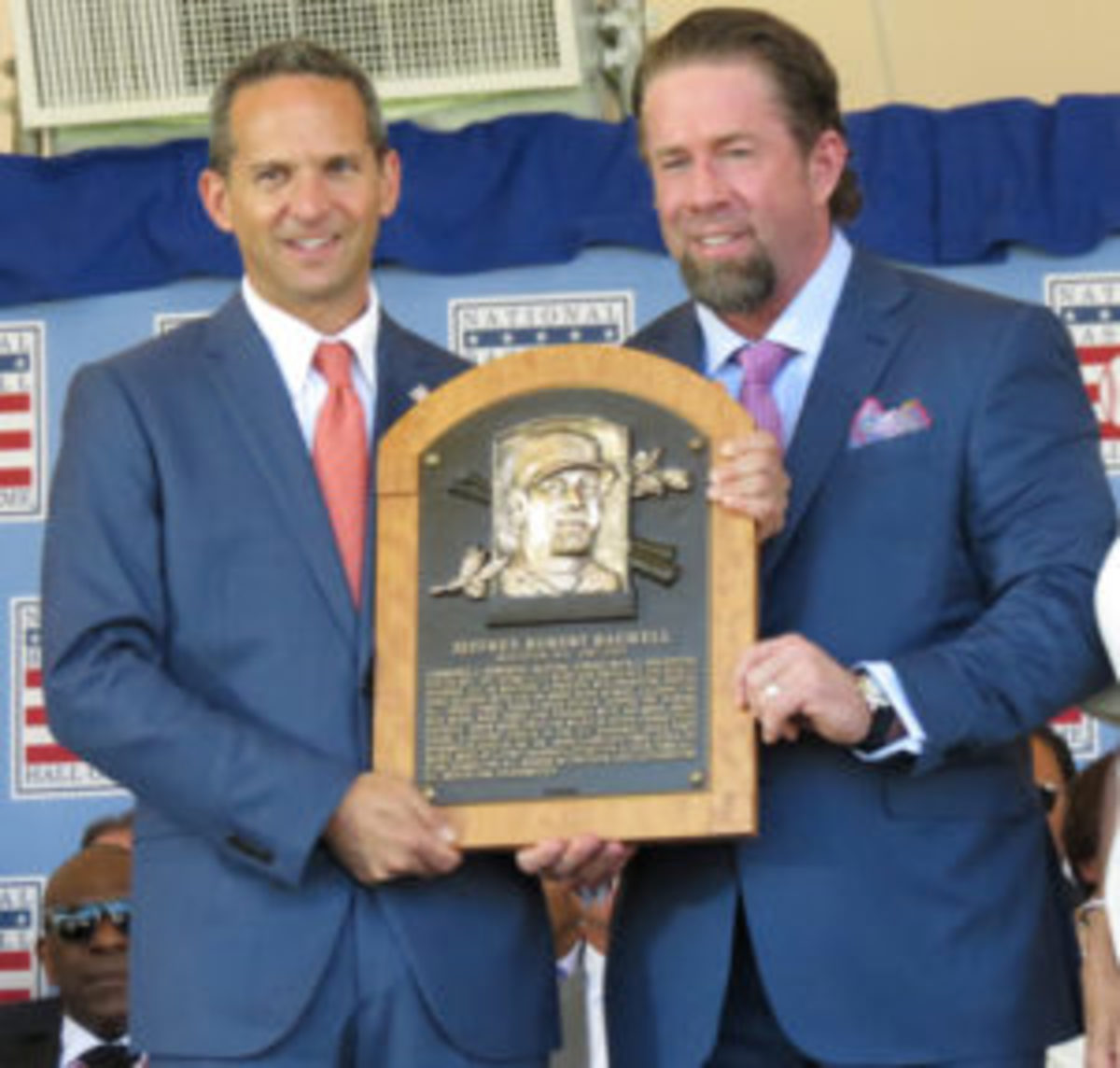  Jeff Bagwell (right) receives his Hall of Fame plaque after being inducted into the Baseball Hall of Fame. (David Moriah photos)