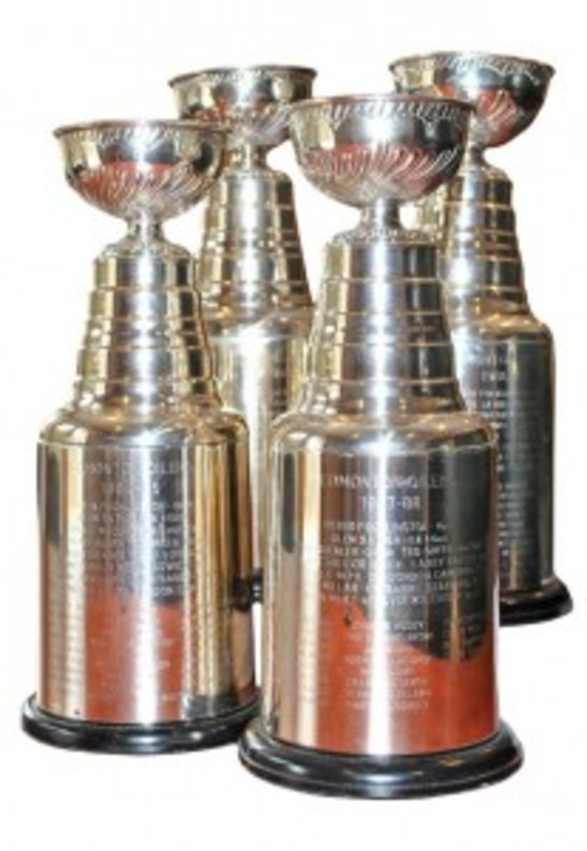 Collection of four Stanley Cup Trophies awarded to Kevin McClelland of the Edmonton Oilers (1984, 1985, 1987, 1988), $32,545. Grey Flannel Auctions image.
