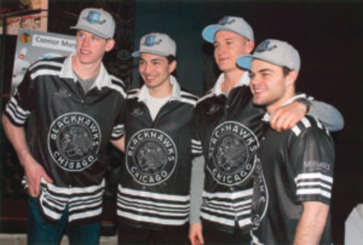  Chicago Blackhawks players (LEFT TO RIGHT) Connor Murphy, Dylan Sikura, Anton Forsling and Alex Debrincat.