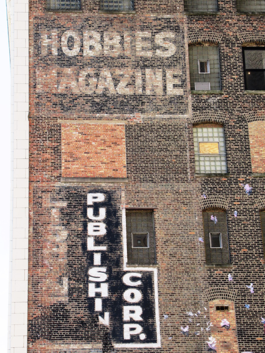 Hobbies and Lightner Publishing still have “ghost” ads on the Lightner Building. Photo: George Vrechek