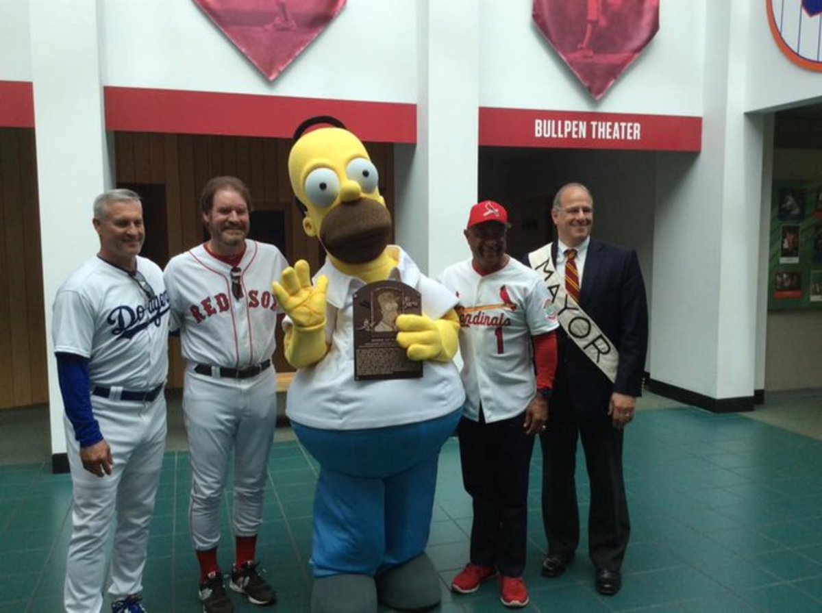 As mayor of Cooperstown, Katz participated when the Hall of Fame “inducted” Homer Simpson in 2017 to celebrate the 25anniversary of the “Homer at the Bat” episode of the “Simpsons.”