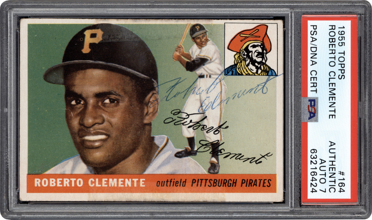 A 1955 Topps signed Roberto Clemente rookie card.