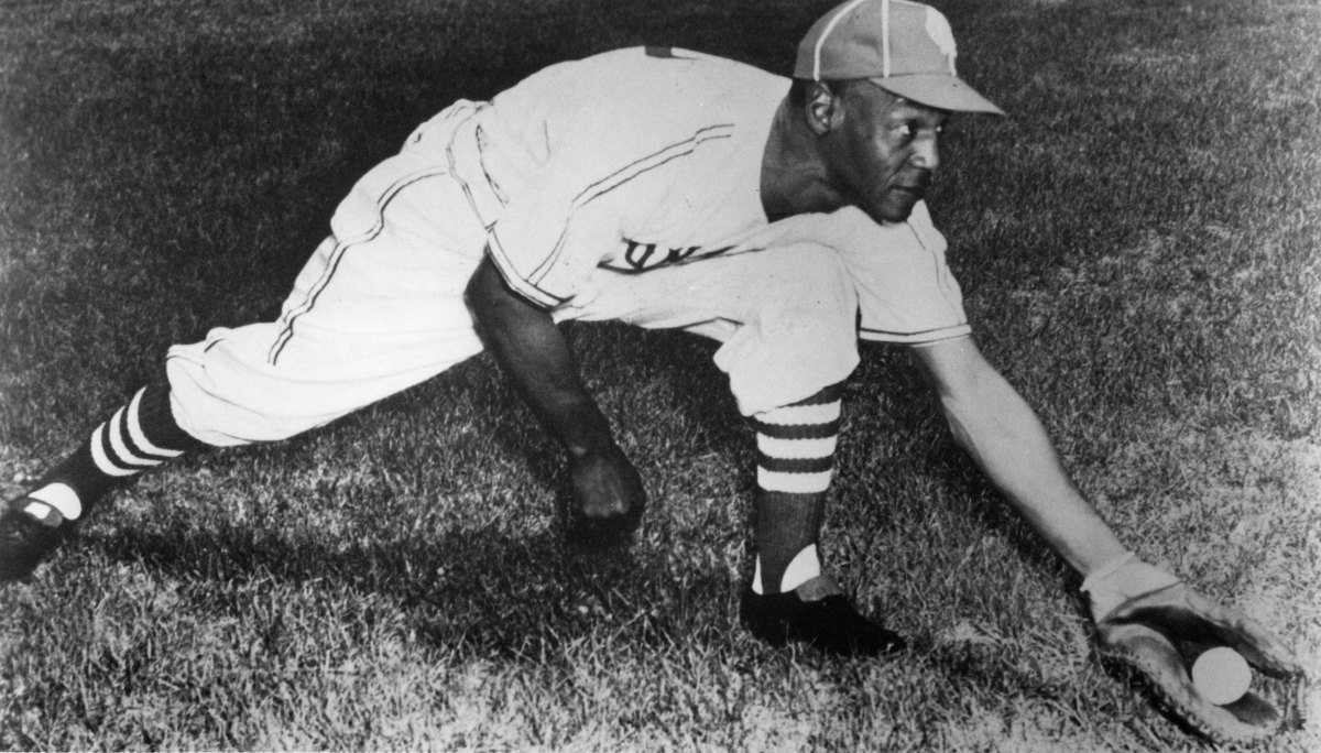 Buck O'Neill, first baseman and manager of the Kansas City Monarchs. shows off his stretch in a 1950 photograph.