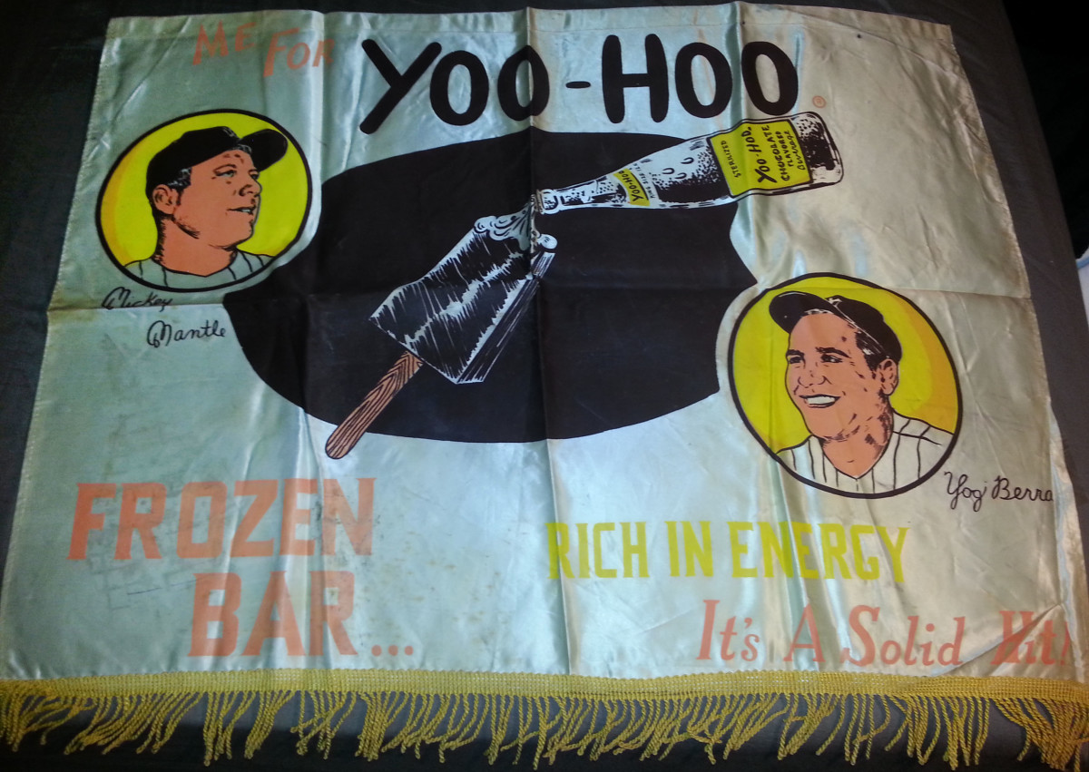 Yoo-Hoo banner featuring Mickey Mantle and Yogi Berra.