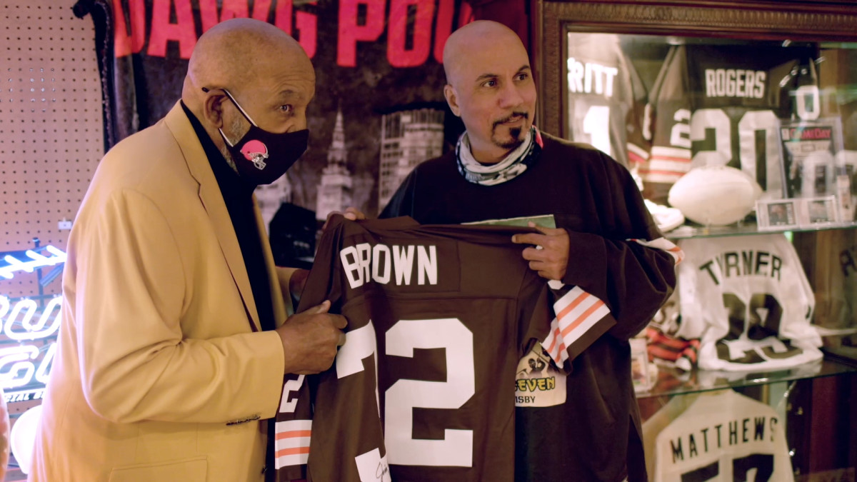 NFL legend Jim Brown with Cleveland Browns fan and memorabilia collector Ray Prisby.