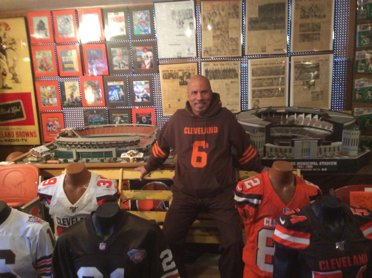 Collector Ray Prisby at his home with his Cleveland Browns collection.