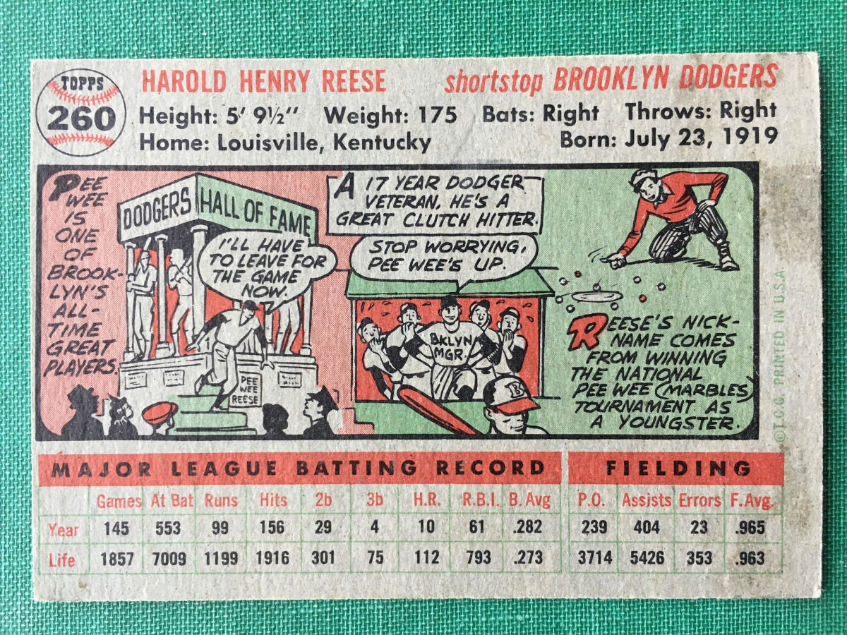 The back of a 1956 Topps Pee Wee Reese cards highlights his prowess as a marbles player.
