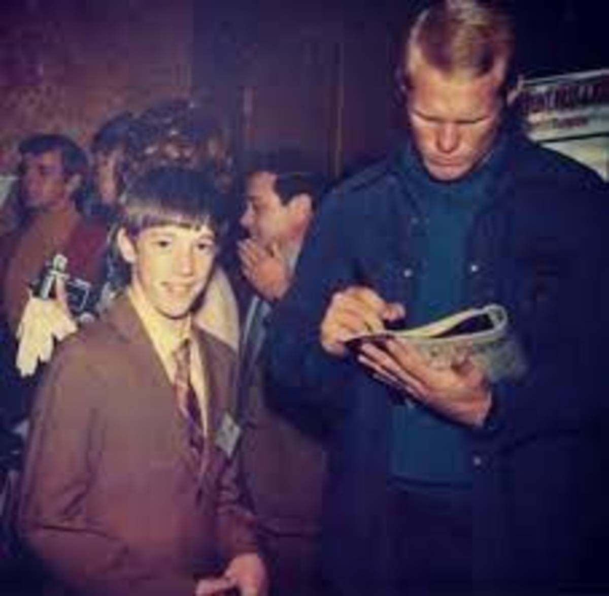 A young Jim Kelly with his hero, former NFL star Terry Bradshaw.
