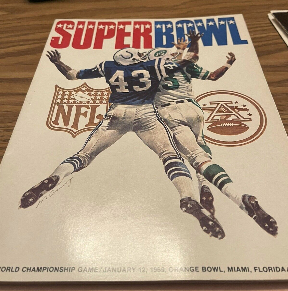 Program from Super Bowl III included in a press kit from the game.