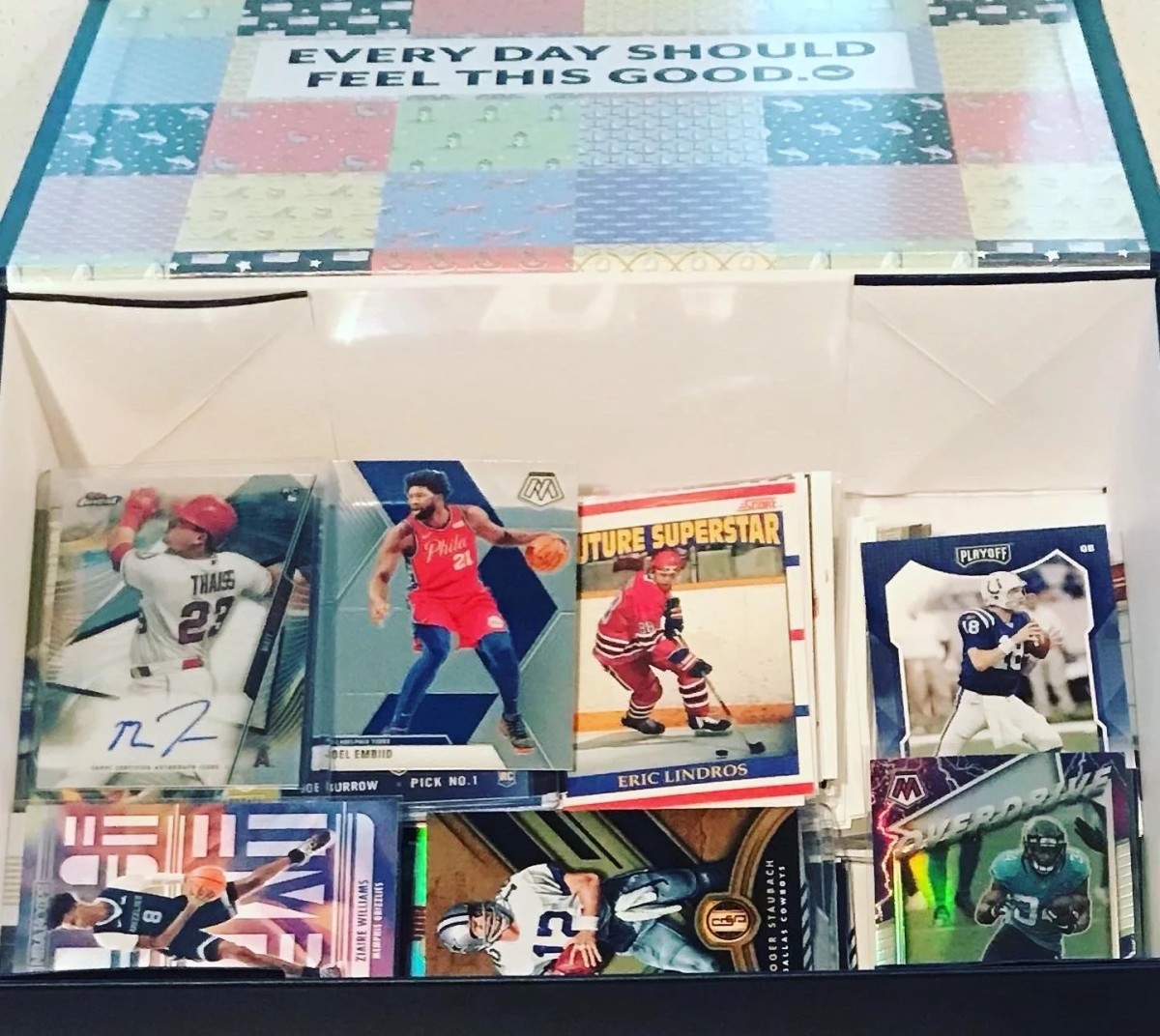 The sports card collection of Laura Fleming and her son.